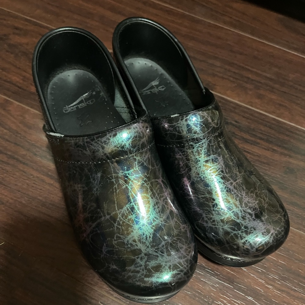 Metallic Dansko Clogs never worn.